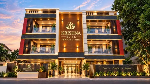 Krishna Elite Senior Living illuminated modern residence building exterior in Chennai with landscaped entrance